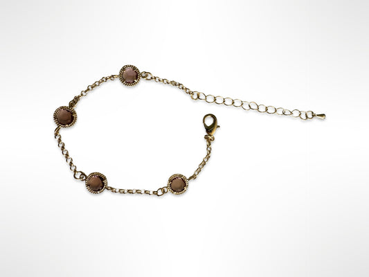 Pulsera chapa de oro con piedras moradas